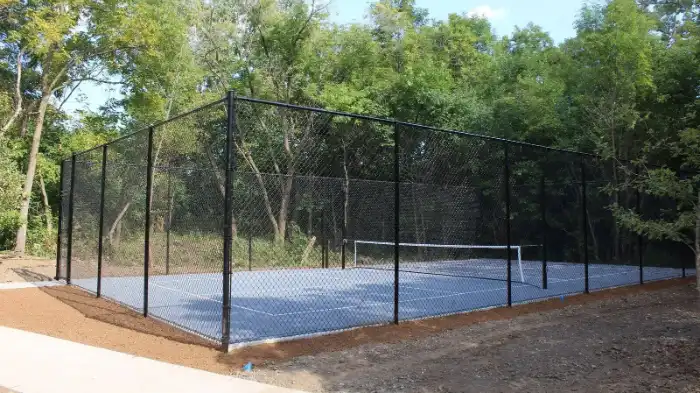 Installation Of Fence For Building An At Home Pickleball Court